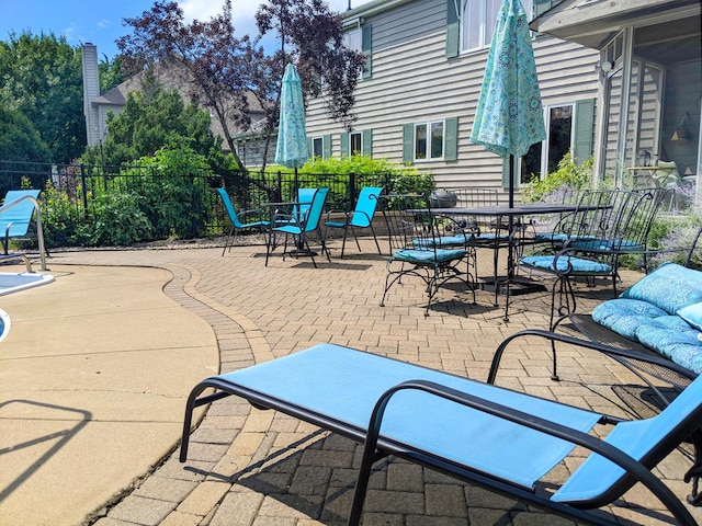 view of patio with fence