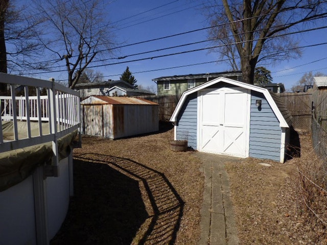 view of shed featuring a fenced backyard