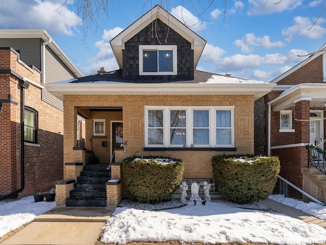 view of front of property featuring brick siding