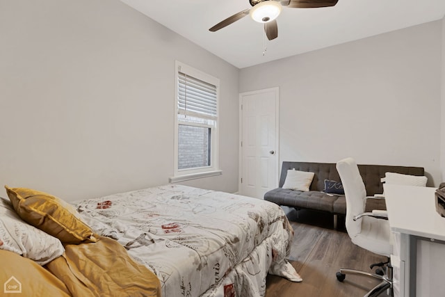 bedroom featuring wood finished floors and ceiling fan