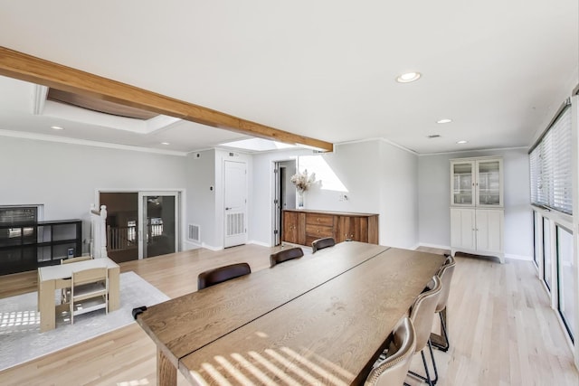 dining space with recessed lighting, visible vents, ornamental molding, and light wood finished floors