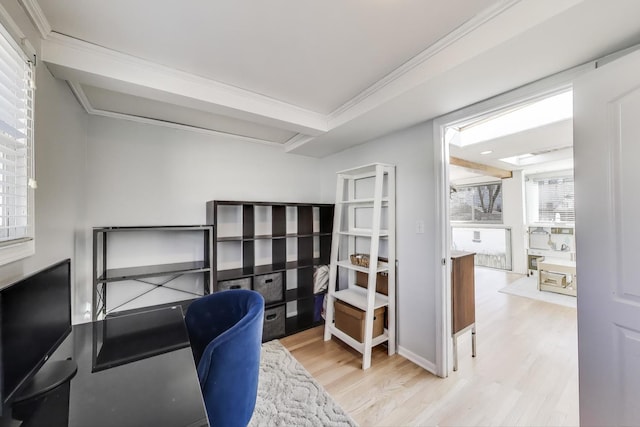 office featuring light wood-style floors and ornamental molding