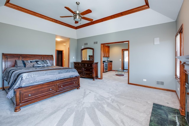 bedroom with baseboards, visible vents, and light carpet