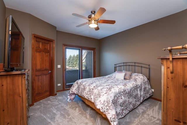 carpeted bedroom with baseboards, access to exterior, and a ceiling fan