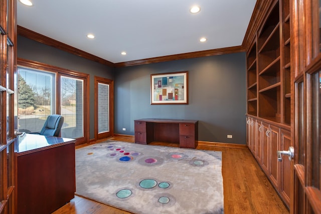 office with light wood finished floors, recessed lighting, crown molding, and baseboards