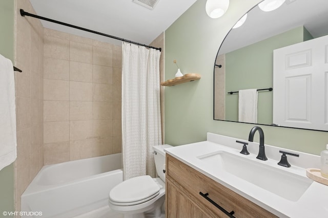 full bath with vanity, shower / bath combination with curtain, toilet, and visible vents