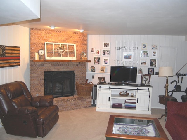 living room featuring carpet flooring and a fireplace