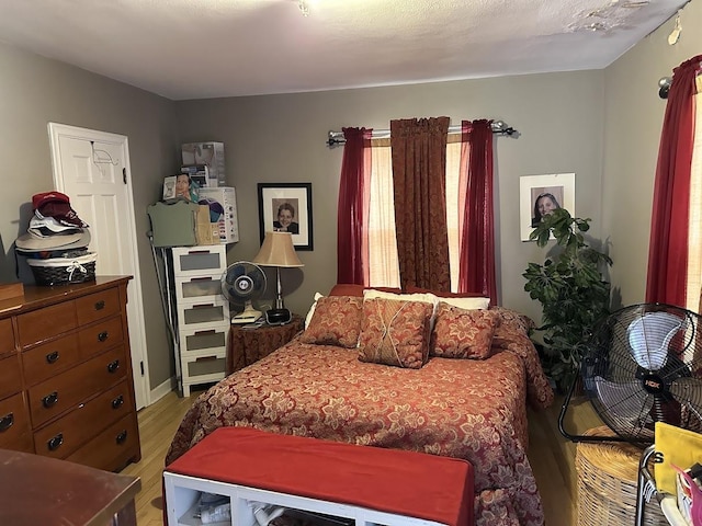 bedroom with light wood-style flooring