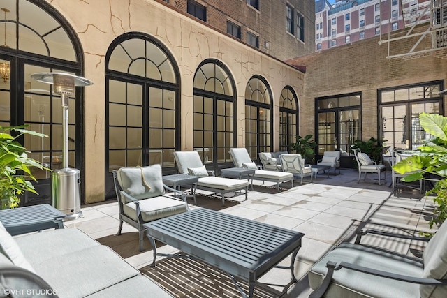 view of patio with french doors and outdoor lounge area