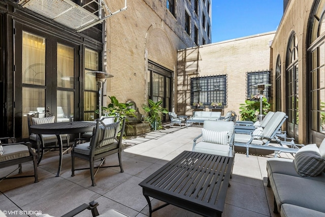 view of patio featuring an outdoor hangout area and outdoor dining space