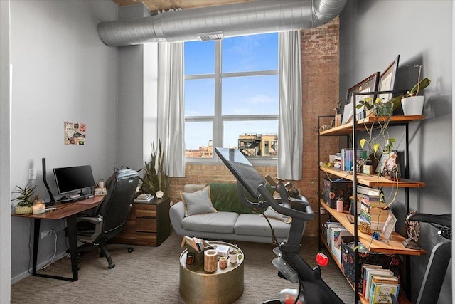 office area with visible vents and carpet