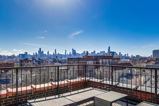 balcony featuring a view of city