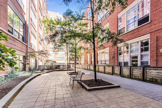 surrounding community featuring a patio