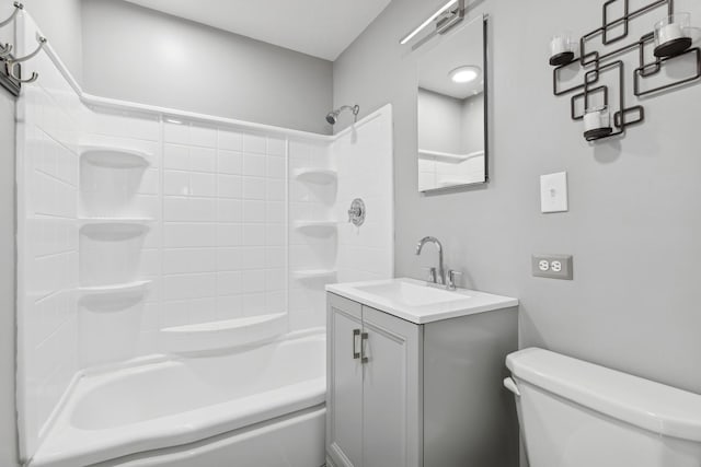 bathroom with shower / bathtub combination, toilet, and vanity