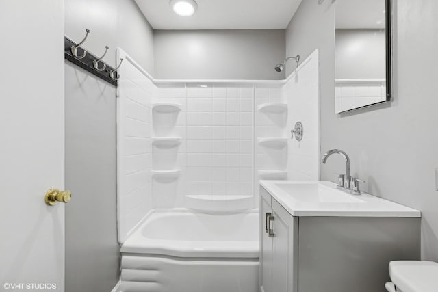 full bathroom featuring shower / bathtub combination, toilet, and vanity