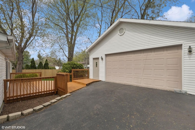garage with fence