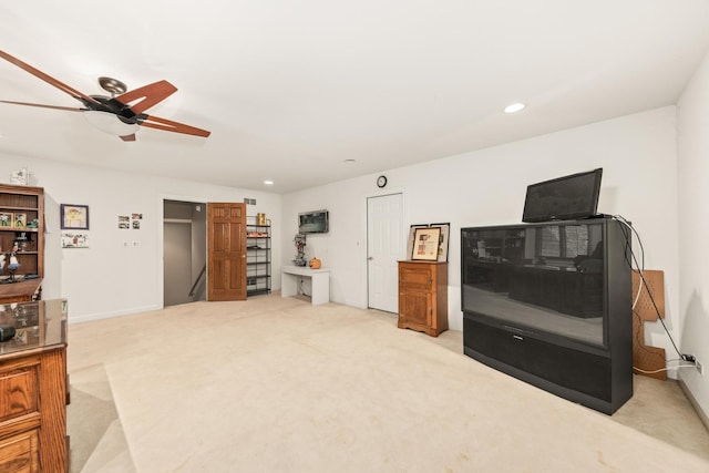 interior space with recessed lighting, baseboards, light carpet, and ceiling fan