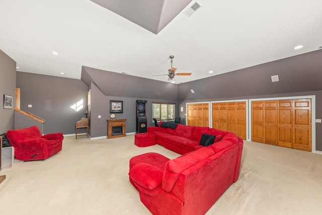 living area with visible vents, baseboards, lofted ceiling, carpet floors, and recessed lighting