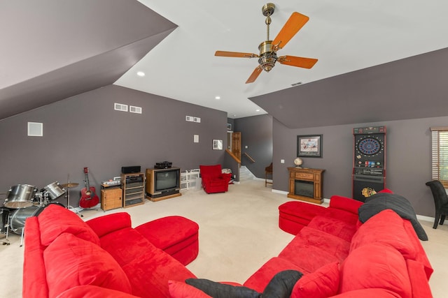 living room featuring ceiling fan, stairs, lofted ceiling, carpet flooring, and recessed lighting