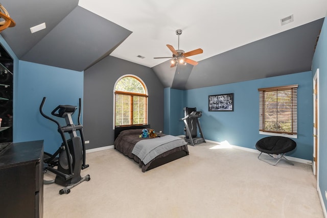 bedroom with visible vents, baseboards, carpet, and vaulted ceiling