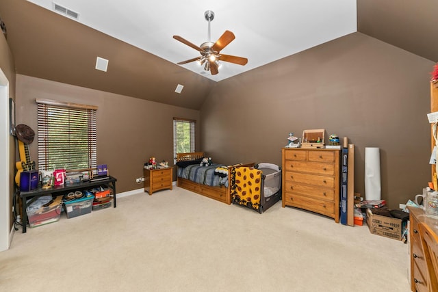 bedroom featuring visible vents, carpet floors, and vaulted ceiling