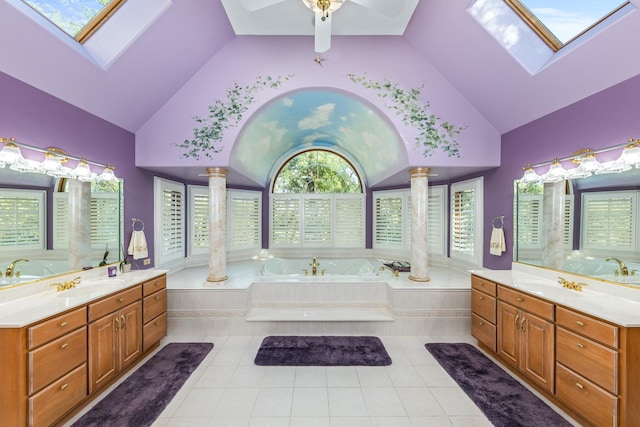 full bath featuring a bath, tile patterned floors, and a skylight