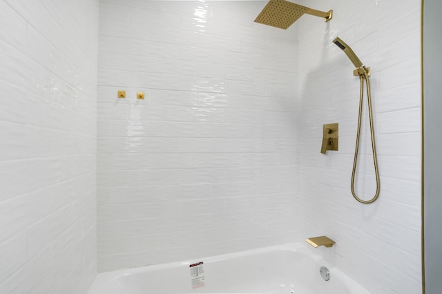 bathroom with shower / washtub combination