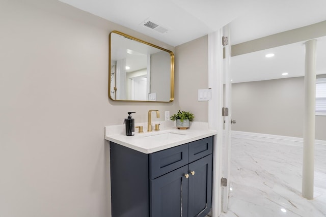 bathroom featuring visible vents, recessed lighting, and vanity