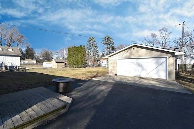 detached garage with fence