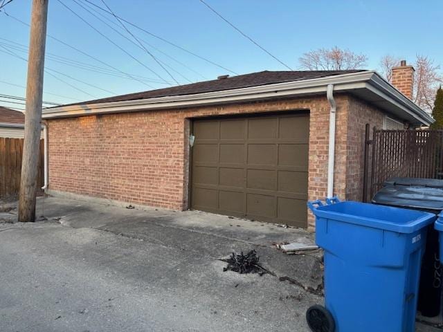 garage with fence