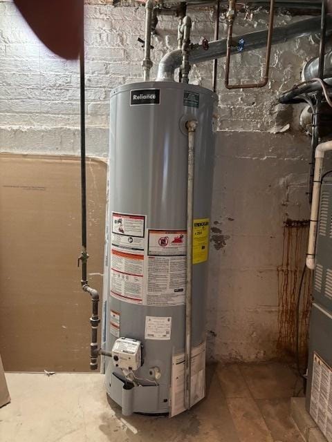 utility room with water heater