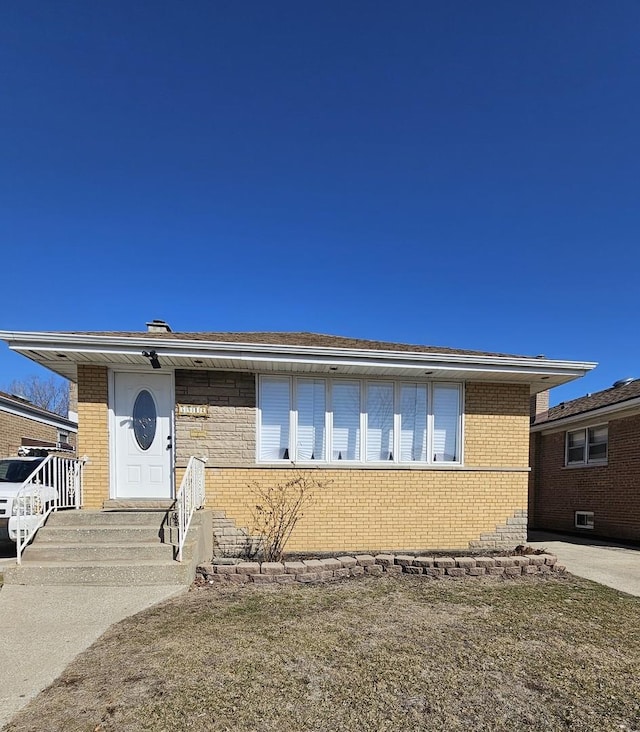 view of front facade with brick siding