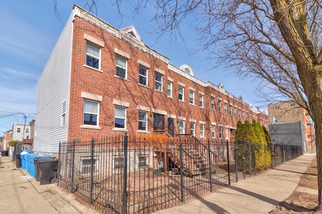 view of property featuring a fenced front yard