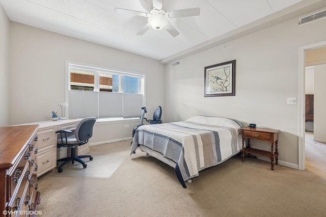 bedroom featuring visible vents, baseboards, light colored carpet, and ceiling fan