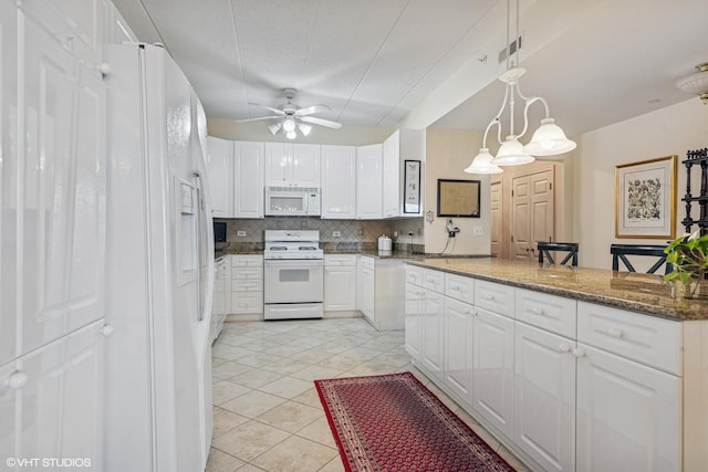 kitchen featuring white appliances, light tile patterned floors, a ceiling fan, decorative backsplash, and white cabinetry