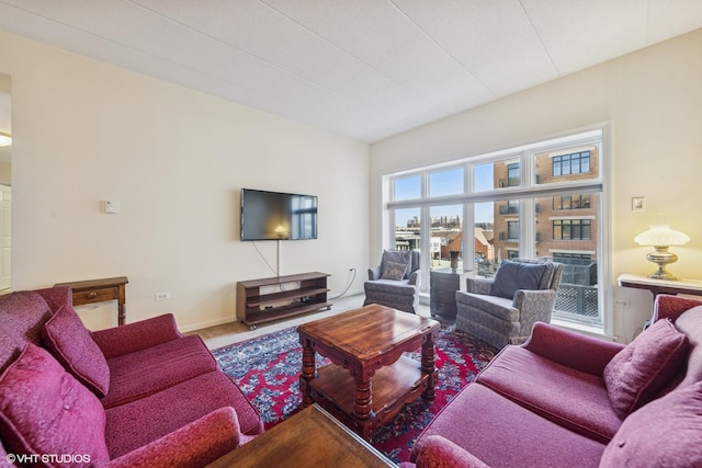 living room featuring baseboards