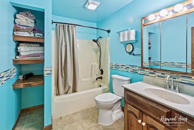 495 Water Tower Rd S, Manteno, IL 60950 - full bath with toilet, backsplash, vanity, tile patterned flooring, and shower / bath combination with curtain