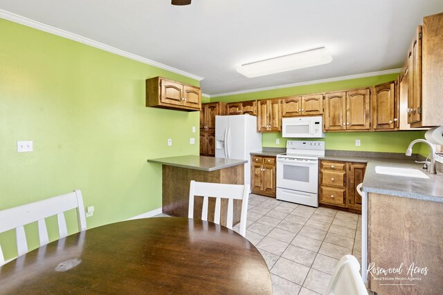 495 Water Tower Rd S, Manteno, IL 60950 - kitchen with light tile patterned flooring, crown molding, a sink, brown cabinets, and white appliances