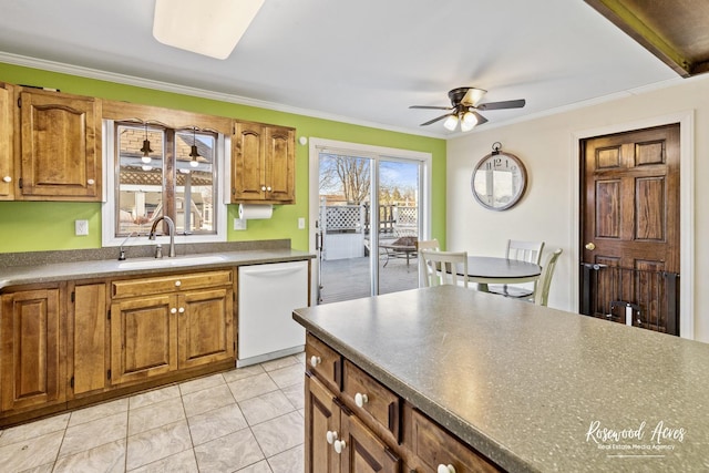 495 Water Tower Rd S, Manteno, IL 60950 - kitchen featuring dishwasher, brown cabinets, dark countertops, a ceiling fan, and a sink