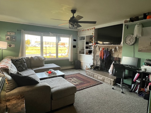 living area featuring a brick fireplace, a baseboard radiator, carpet floors, and ceiling fan