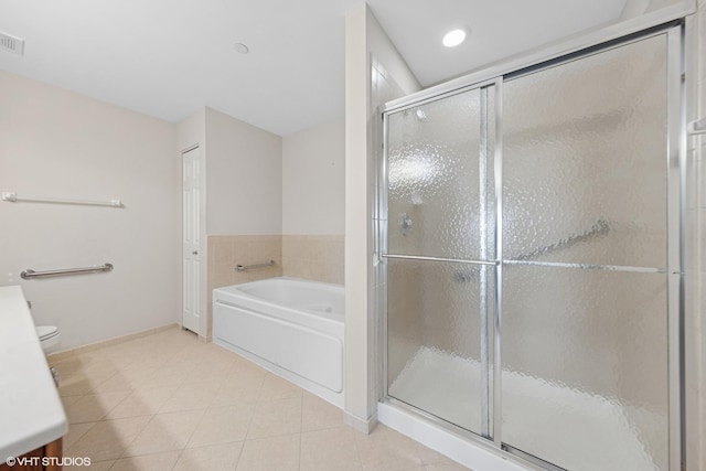 full bath with a bath, a shower stall, and tile patterned floors