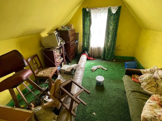 bonus room with carpet flooring and vaulted ceiling