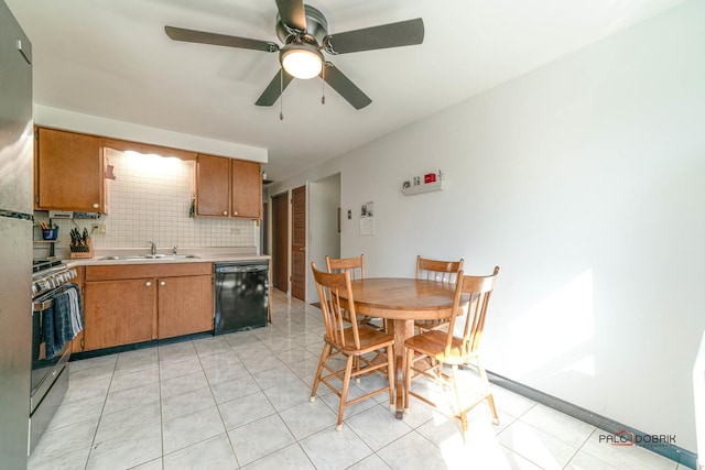 kitchen with stainless steel gas stove, a ceiling fan, light countertops, decorative backsplash, and dishwasher