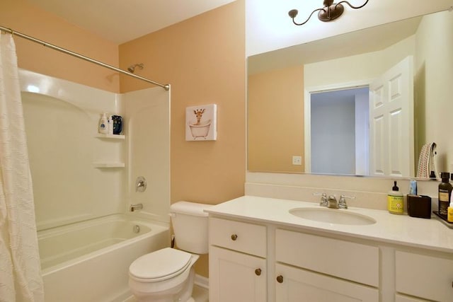 full bathroom with vanity, shower / bath combination with curtain, and toilet