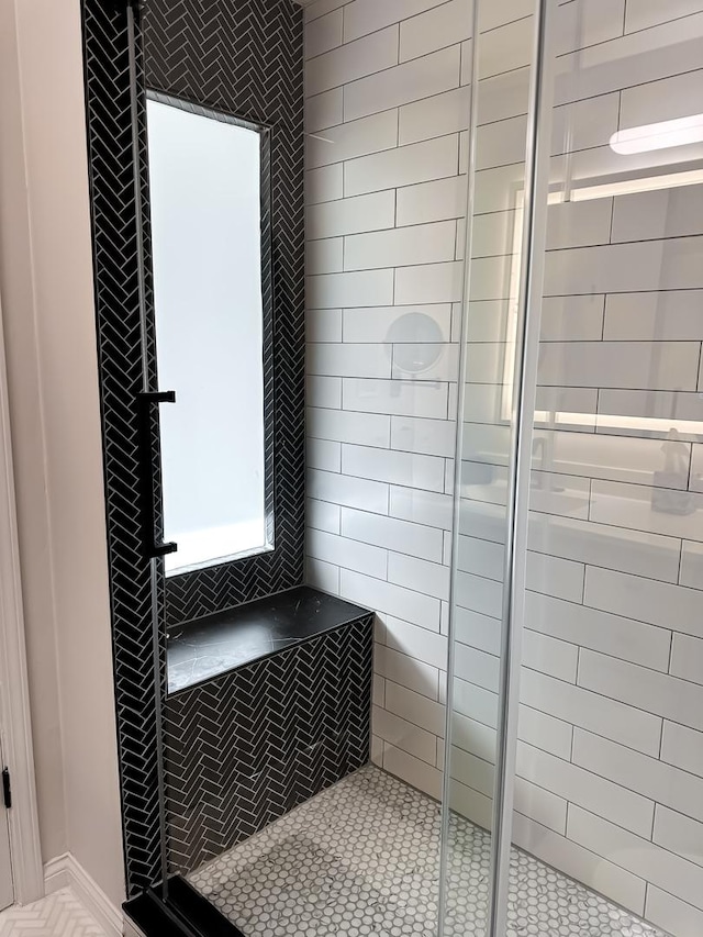 full bathroom featuring a shower stall