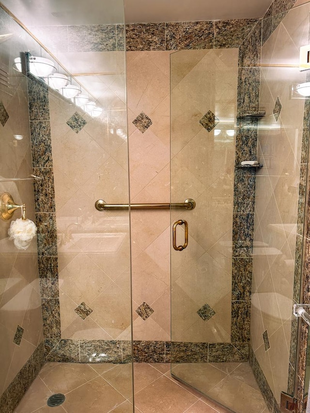 bathroom with a stall shower