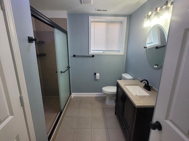 full bath featuring vanity, tile patterned floors, visible vents, and a stall shower