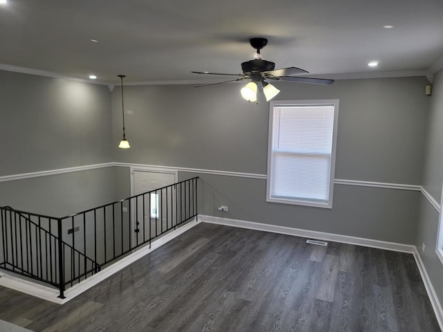 unfurnished room with wood finished floors, recessed lighting, crown molding, baseboards, and ceiling fan