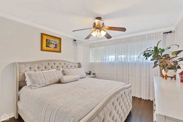 bedroom featuring dark wood finished floors, a ceiling fan, and ornamental molding