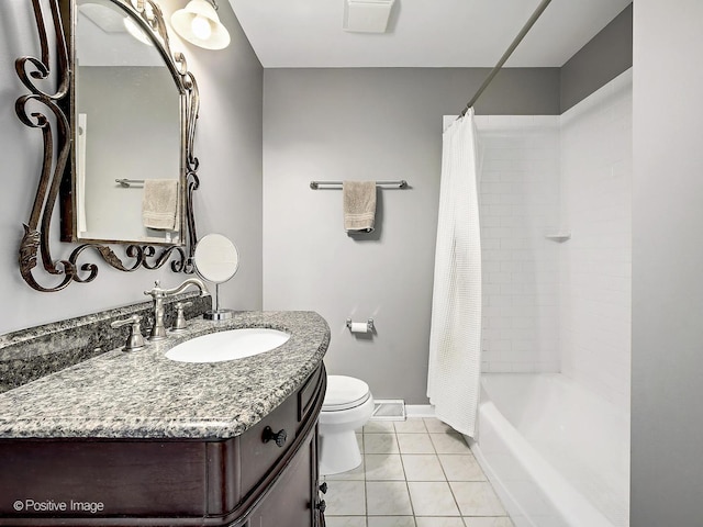 bathroom featuring baseboards, toilet, shower / tub combo, tile patterned floors, and vanity